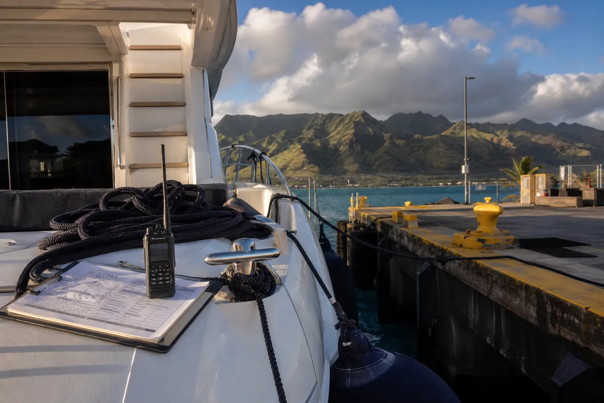 Yacht deck details with provisioning manifest and radio.